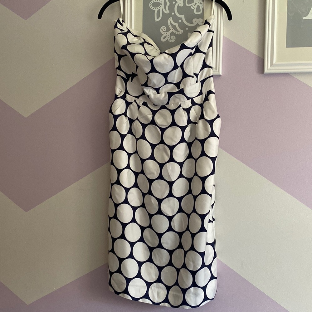 Net without tags. Strapless dress with pockets.